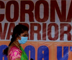 epa08603291 An Indian woman wears a face mask as a preventive measure against the Coronavirus in Bangalore, India, 14 August 2020. Countries around the world have started to ease coronavirus disease (COVID-19) lockdown restrictions in an effort to restart their economies and help people in their daily routines amid the coronavirus pandemic.  EPA/JAGADEESH NV