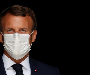 epa08630913 French President Emmanuel Macron, wearing a protective face mask, visits a site of pharmaceutical group Seqens, a global leader on the production of active pharmaceutical ingredients, to mobilize innovation and support the research on the coronavirus disease (COVID-19), in Villeneuve-la-Garenne, France, 28 August 2020.  EPA/CHRISTIAN HARTMANN / POOL  MAXPPP OUT