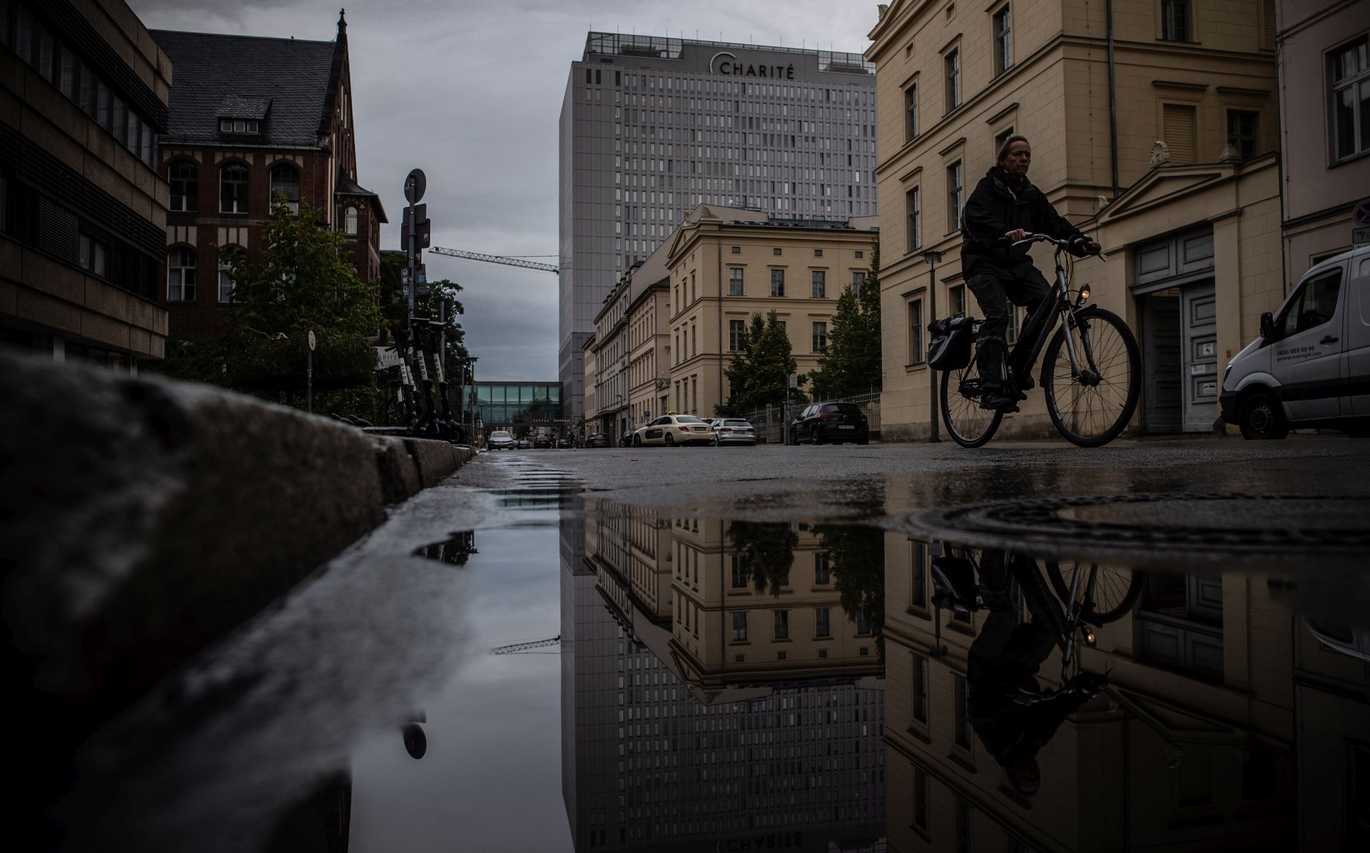 epa08642343 Charite hospital is reflected in a puddle in Berlin, Germany, 02 September 2020. The German government on 02 September 2020 said 'the unequivocal proof' that Navalny was poisoned with a nerve agent from the Novichok group was established. Navalny is treated at the Charite hospital in Berlin since 22 August 2020. He was first placed in an hospital in Omsk, Russia, after he felt bad on board of a plane on his way from Tomsk to Moscow. The flight was interrupted and after landing in Omsk Navalny was delivered to hospital with a suspicion on a toxic poisoning.  EPA/FILIP SINGER