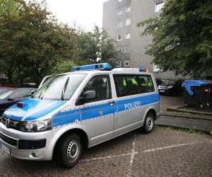 03 September 2020, North Rhine-Westphalia, Solingen: A police car is parked in front of an apartment building, where a 27-year-old mother is said to have killed five children in Solingen. Photo: Oliver Berg/dpa