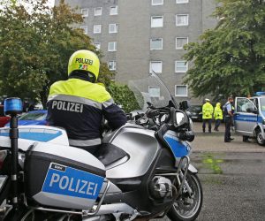 03 September 2020, North Rhine-Westphalia, Solingen: Police present outside an apartment building, where a 27-year-old mother is said to have killed five children in Solingen. Photo: Oliver Berg/dpa