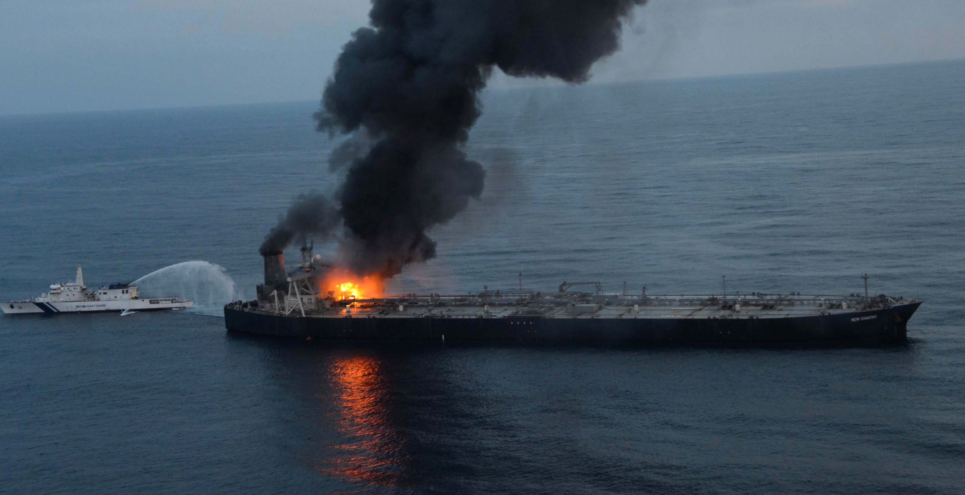 epa08645366 A handout photo made available by the Sri Lankan Air Force Media shows the Panama-flagged crude oil vessel MT New Diamond on fire off the east coast of Sri Lanka, 04 September 2020. The MT New Diamond, which was carrying 270,000 metric tons of crude oil from Kuwait, was on its way to the Indian port of Paradip when it caught fire.  EPA/SRI LANKAN AIR FORCE MEDIA HANDOUT HANDOUT HANDOUT EDITORIAL USE ONLY/NO SALES HANDOUT EDITORIAL USE ONLY/NO SALES