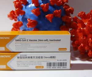epa08648234 A COVID-19 coronavirus vaccine candidate on display at Sinovac Biotech Ltd stand at the 2020 China International Fair for Trade in Services (CIFTIS) in Beijing, China, 05 September 2020. This fair is the first such large-scale event on Chinese soil since the start of the COVID-19 coronavirus pandemic.  EPA/WU HONG