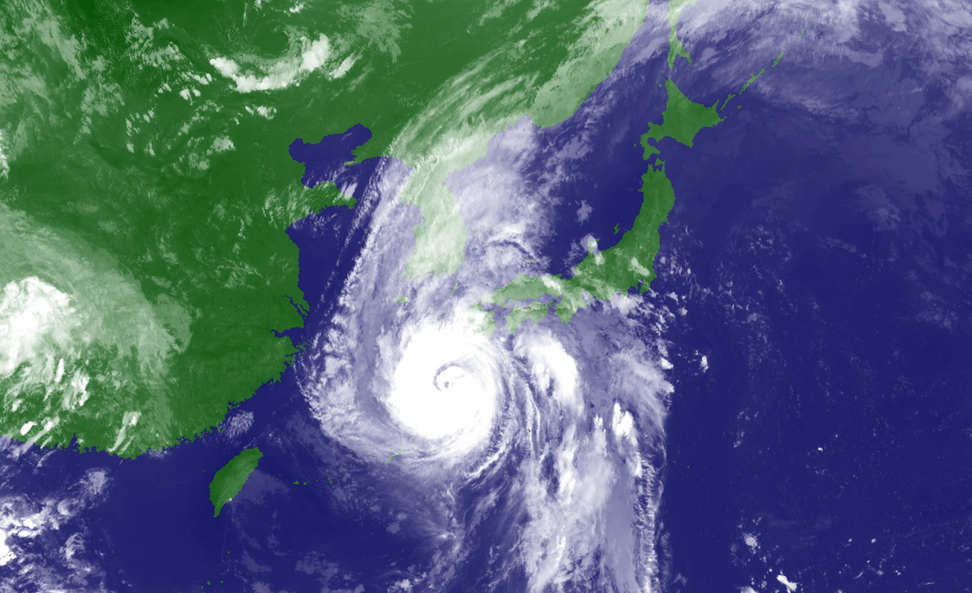 epa08650146 A handout photo made available by Japan's Meteorological Agency shows an infrared image from Himawari geostationary satellites, operated by the Japan Meteorological Agency, released on 06 September 2020 of powerful typhoon Haishen (C) moving northward southwest of Kyushu Island, southwestern Japan, 06 September 2020. Japan's Meteorological Agency has warned and ordered evacuation to more than 400,000 people in southwestern Japan. Railway and flight services are suspended in western to southwestern Japan due to the typhoon.  EPA/JAPAN METEOROLOGICAL AGENCY HANDOUT JAPAN OUT HANDOUT EDITORIAL USE ONLY/NO SALES