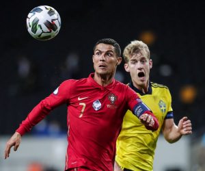 epa08655186 Sweden's Filip Helander (R) in action against Portugal's Cristiano Ronaldo during the UEFA Nations League match at Friends Arena, in Stockholm, Sweden, 08 September 2020.  EPA/MARIO CRUZ