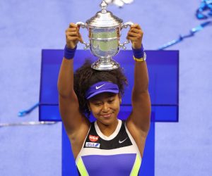epaselect epa08665467 Naomi Osaka of Japan celebrates with the Championship Trophy after defeating Victoria Azarenka to win the Women's Final match on the thirteenth day of the US Open Tennis Championships the USTA National Tennis Center in Flushing Meadows, New York, USA, 12 September 2020. Due to the coronavirus pandemic, the US Open is being played without fans and runs from 31 August through 13 September.  EPA/JUSTIN LANE