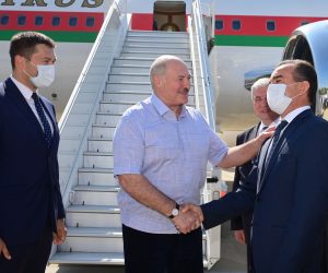epa08668278 Belarusian President Alexander Lukashenko (C) is welcomed by officials as he disembarks from a government plane upon his arrival at the Black Sea resort of Sochi, Russia, 14 September 2020. Lukashenko is in Sochi for the first fcae-to-face talks with Russian President Putin since Lukashenko's contested 09 August re-election and the subsequent and growing opposition protests.  EPA/ANDREI STASEVICH / BELTA POOL / POOL MANDATORY CREDIT