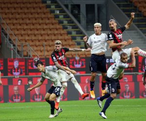 epa08687148 AC Milan's Zlatan Ibrahimovic  (R) scores the 1-0 during the Italian Serie A soccer match Ac Milan vs Fc Bologna at Giuseppe Meazza stadium in Milan, Italy, 21 September  2020.  EPA/MATTEO BAZZI