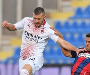 epa08702042 Milan's Ante Rebic is tackled by Crotone's Lisandro Magallan (R) during the Italian Serie A soccer match between FC Crotone and AC Milan at the Ezio Scida stadium in Crotone, Italy, 27 September 2020.  EPA/CARMELO IMBESI