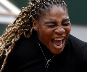 epa08703718 Serena Williams of the USA reacts as she plays Kristie Ahn of the USA during their women’s first round match during the French Open tennis tournament at Roland ​Garros in Paris, France, 28 September 2020.  EPA/JULIEN DE ROSA