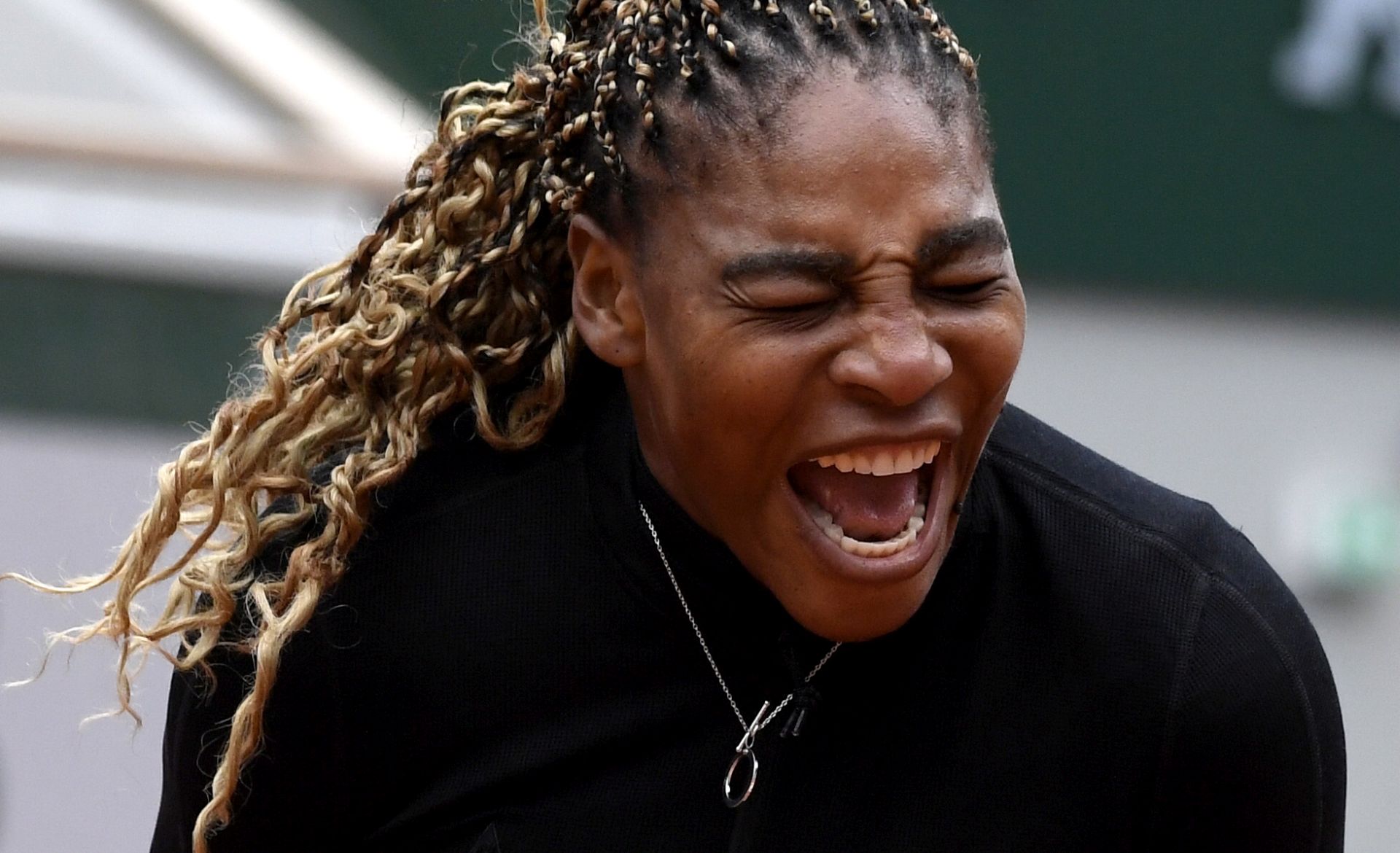 epa08703718 Serena Williams of the USA reacts as she plays Kristie Ahn of the USA during their women’s first round match during the French Open tennis tournament at Roland ​Garros in Paris, France, 28 September 2020.  EPA/JULIEN DE ROSA