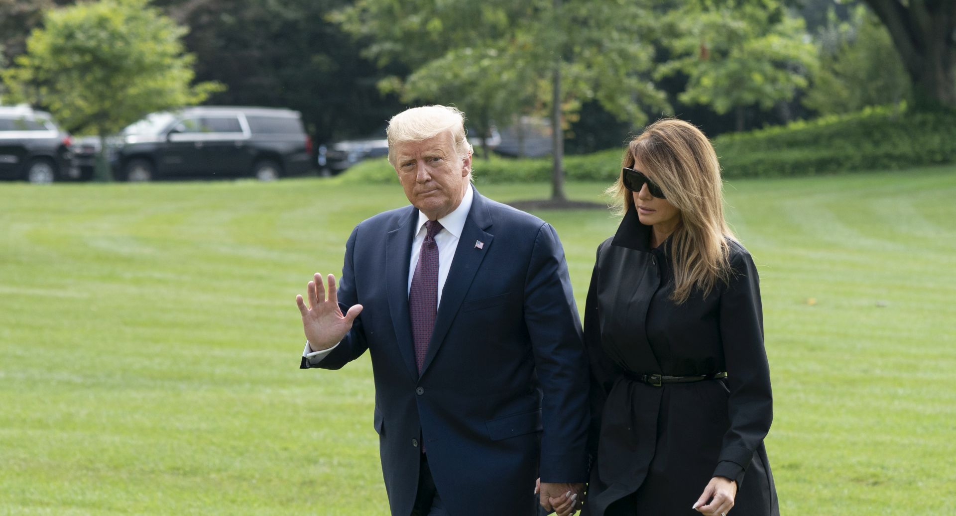 epa08662088 US President Donald J. Trump (L) and First lady Melania Trump (R) return to the White House, in Washington, DC, USA, on 11 September 2020, after attending a Flight 93 National Memorial 19th Anniversary of the 9/11 terrorist attack Observance in Shanksville, Pennsylvania.  EPA/Chris Kleponis / POOL