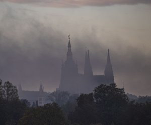 epa08707720 Prague Castle is seen behind morning fog in Prague, Czech Republic, 30 September 2020.  EPA/MARTIN DIVISEK