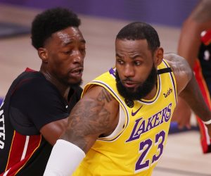 epa08710695 Los Angeles Lakers forward LeBron James (R) is guarded by Miami Heat forward Bam Adebayo (L) in the first half of their NBA Finals basketball game one at the ESPN Wide World of Sports Complex in Kissimmee, Florida, USA, 30 September 2020.  EPA/ERIK S. LESSER  SHUTTERSTOCK OUT