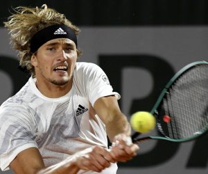 epa08716178 Alexander Zverev of Germany hits a backhand during his third round match against Marco Cecchinato of Italy at the French Open tennis tournament at Roland Garros in Paris, France, 02 October 2020.  EPA/JULIEN DE ROSA