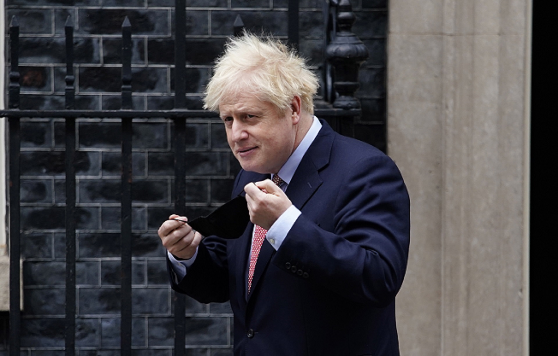 epa08723622 British Prime Minister Boris Johnson leaves 10 Downing Street in London, Britain, 06 October 2020. Johnson is to attend the Conservative Party Conference, which is held in a virtual format due to Covid-19, and deliver a leader's speech to party members.  EPA/WILL OLIVER