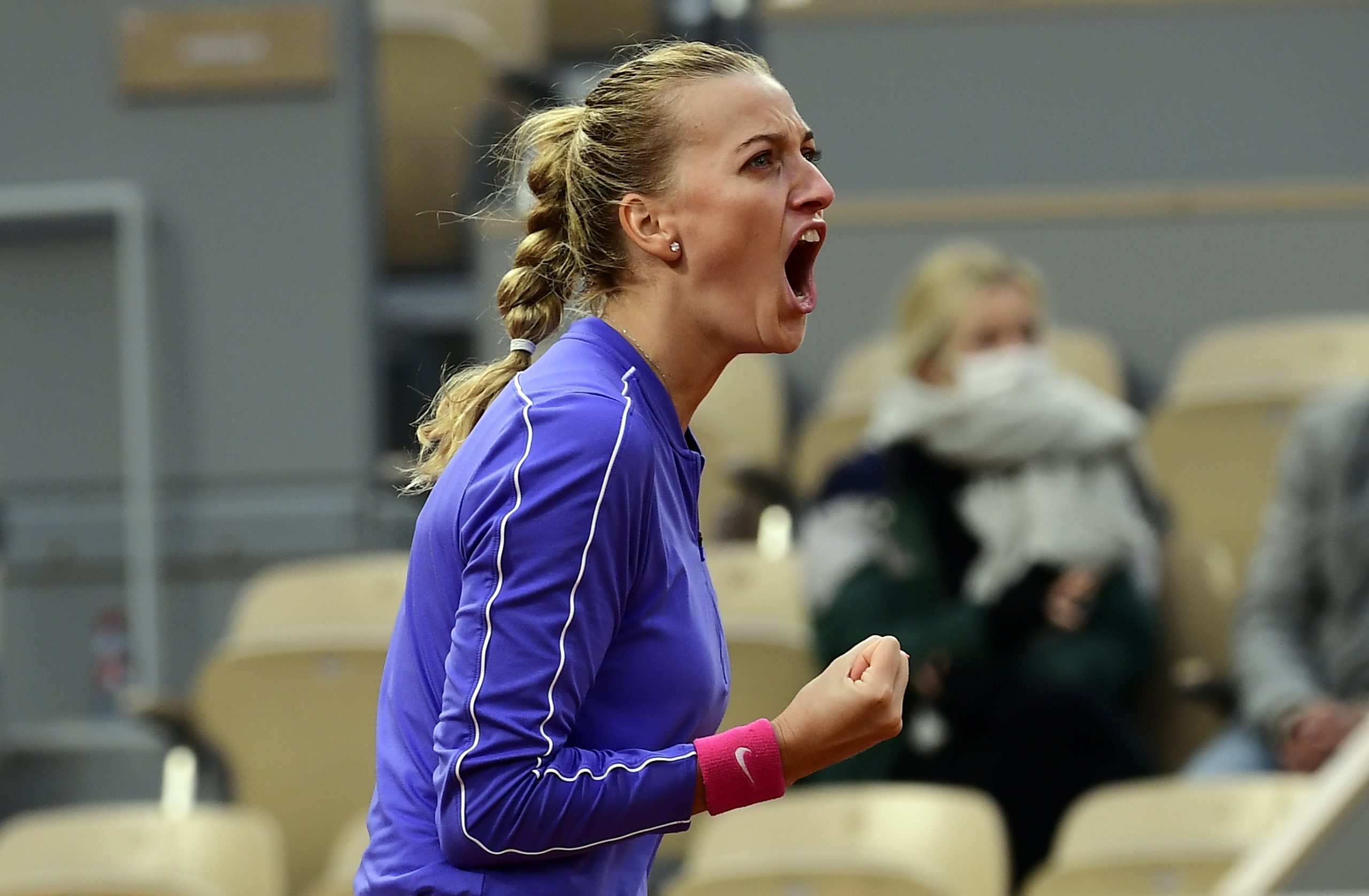 epa08729772 Petra Kvitova of the Czech Republic reacts as she plays Sofia Kenin of the USA during their women’s semi final match during the French Open tennis tournament at Roland ​Garros in Paris, France, 08 October 2020.  EPA/JULIEN DE ROSA