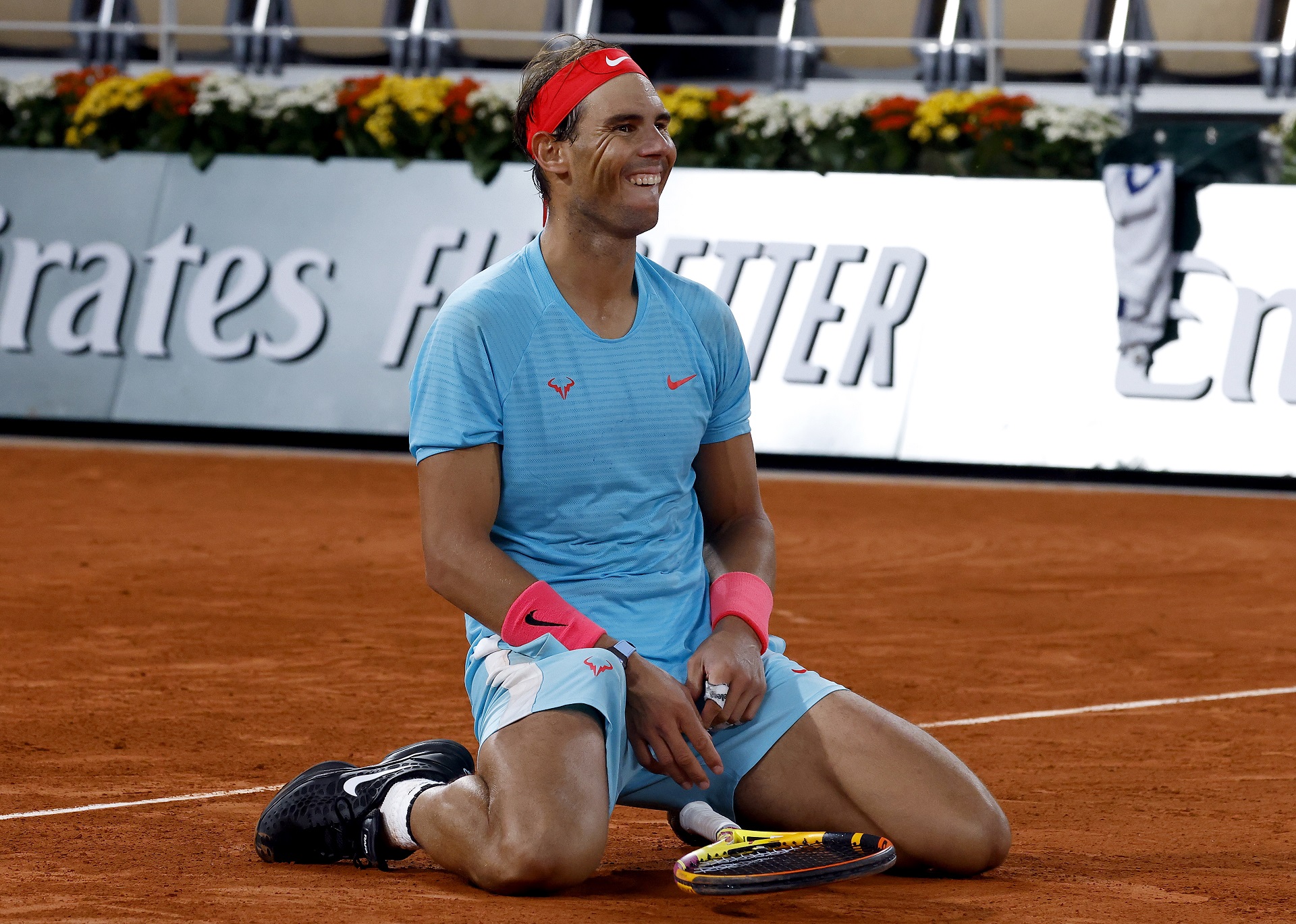 epa08736002 Rafael Nadal of Spain reacts after winning against Novak Djokovic of Serbia in their men’s final match during the French Open tennis tournament at Roland ​Garros in Paris, France, 11 October 2020.  EPA/YOAN VALAT