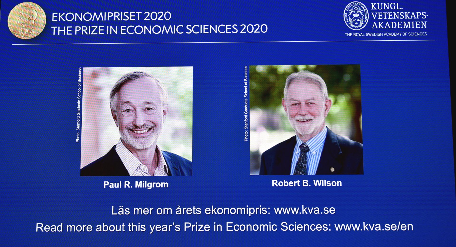 epa08737316 US economists Paul R. Milgrom (L) and Robert B. Wilson (R) receive the Sveriges Riksbank Prize in Economic Sciences in Memory of Alfred Nobel for 2020 presented at a press conference in Stockholm, Sweden, 12 October 2020. Americans Paul Milgrom and Robert Wilson receive the 2020 Nobel Prize in Economic Science for improving auction theory.  EPA/ANDERS WIKLUND SWEDEN OUT