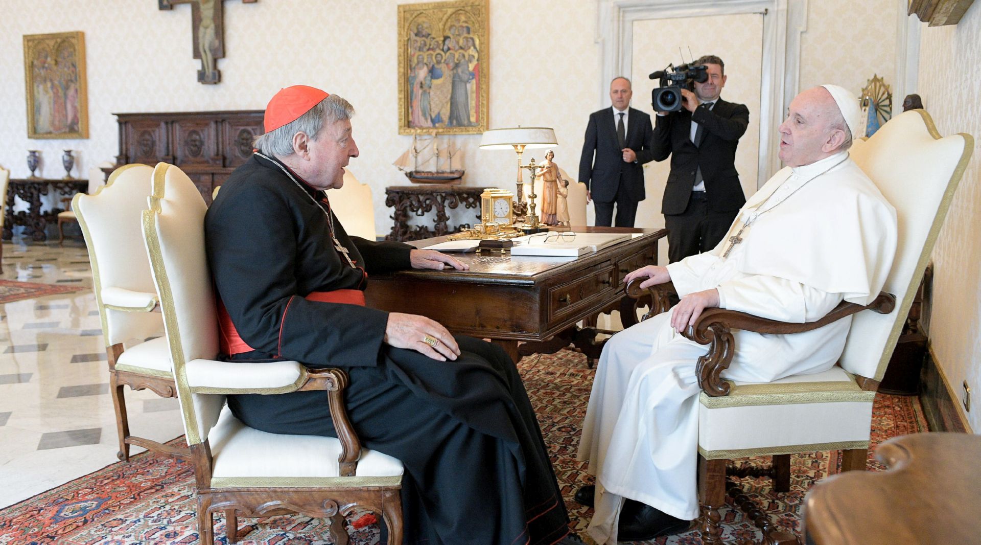 epa08737574 A handout picture provided by the Vatican Media shows Pope Francis speaking with Cardinal George Pell, Prefect Emeritus of the Secretariat for the Economy, during the audience he granted him, in Vatican City, 12 October 2020.  EPA/VATICAN MEDIA HANDOUT  HANDOUT EDITORIAL USE ONLY/NO SALES