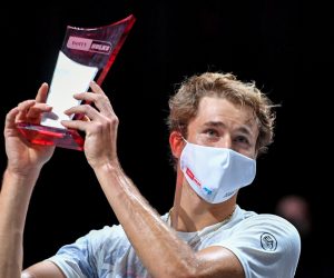 epa08755299 Alexander Zverev of Germany lifts the trophy after winning his final against Felix Auger-Aliassime of Canada at the bett1HULKS Indoors tennis tournament in Cologne, Germany, 18 October 2020.  EPA/SASCHA STEINBACH