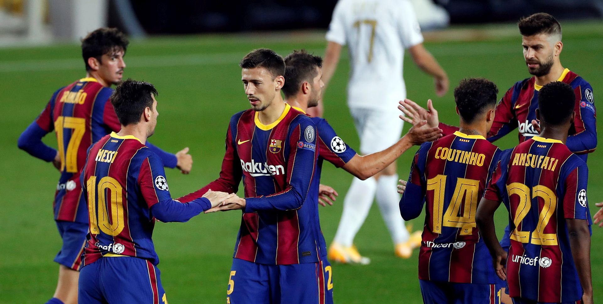 epa08760207 FC Barcelona's striker Lionel Messi (L) celebrates with teammates after scoring the 1-0 leading goal from the penalty spot during the UEFA Champions League Group G soccer match between FC Barcelona and Ferencvaros held at Camp Nou stadium, in Barcelona, Spain, 20 October 2020.  EPA/Alberto Estevez
