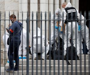 epa08782903 Forensic specialists inspect the scene of a reported knife attack at Notre Dame church in Nice, France, 29 October 2020. According to recent reports, at least three people are reported to have died in what officials treat as a terror attack. The attack comes less than a month after the beheading of a French middle school teacher in Paris on 16 October.  EPA/ERIC GAILLARD / POOL  MAXPPP OUT