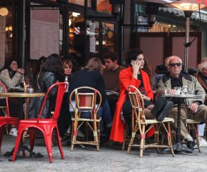 epa08783214 People sit on the terrasse of a restaurant in Paris, France, 29 October 2020. French President Emmanuel Macron announced a return to lockdown, dubbed 'reconfinement' to come into effect on 30 October 2020 as new measures to battle the rise in Covid-19 cases.  EPA/MOHAMMED BADRA