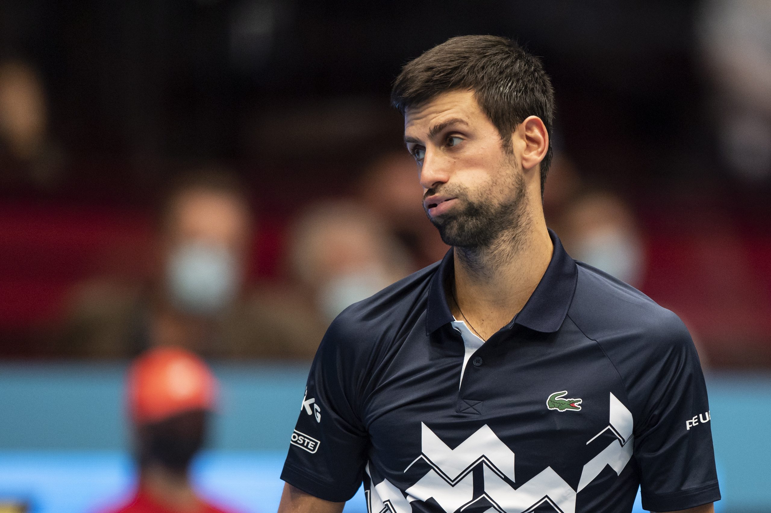 epa08786711 Novak Djokovic of Serbia reacts during his quarter final match against Lorenzo Sonego of Italy at the Erste Bank Open ATP tennis tournament in Vienna, Austria, 30 October 2020.  EPA/CHRISTIAN BRUNA