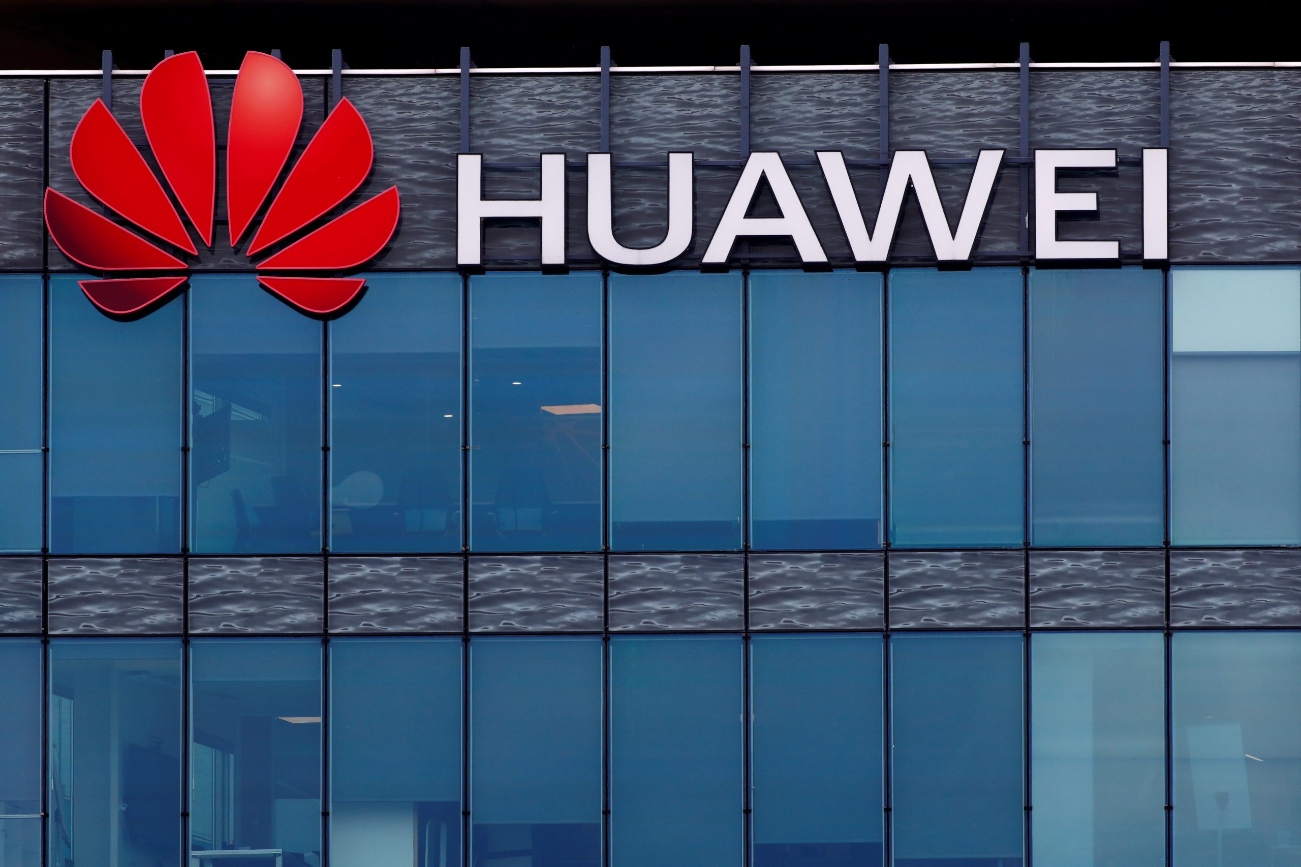 FILE PHOTO: Huawei logo at Huawei Technologies France in Boulogne-Billancourt FILE PHOTO: A view shows a Huawei logo at Huawei Technologies France headquarters in Boulogne-Billancourt near Paris, France, July 15, 2020. REUTERS/Gonzalo Fuentes/File Photo GONZALO FUENTES