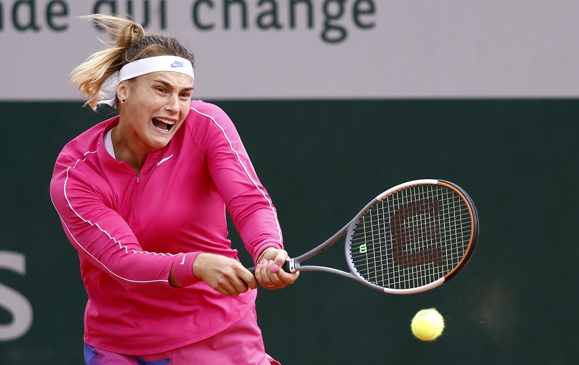 epa08717353 Aryna Sabalenka of Belarus hits a backhand during her third round match against Ons Jabeur of Tunisia during the French Open tennis tournament at Roland Garros in Paris, France, 03 October 2020.  EPA/IAN LANGSDON