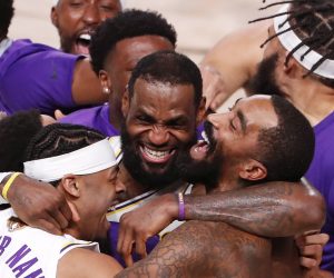 epaselect epa08736869 Los Angeles Lakers forward LeBron James (C) celebrates with teammates after defeating the Miami Heatt to win the NBA Finals basketball game six between the Los Angeles Lakers and the Miami Heat at the ESPN Wide World of Sports Complex in Kissimmee, Florida, USA, 11 October 2020.  EPA/ERIK S. LESSER SHUTTERSTOCK OUT
