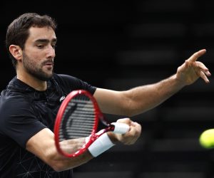 epa08793697 Marin Cilic of Croatia in action during his first round match against Felix Auger-Aliassime of Canada at the Rolex Paris Masters tennis tournament in Paris, France, 02 November 2020.  EPA/YOAN VALAT