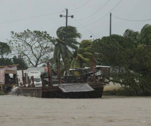 epa08795971 A ship on a river during intense rains and winds due to the passage of category 4 hurricane ETA on the north Caribbean coast of Bilwi, Nicaragua, 03 November 2020. The eye of hurricane Eta, with maximum winds of 240 kilometers per hour, made landfall on 03 Nvember south of the municipality of Bilwi or Puerto Cabezas, in the northern Caribbean of Nicaragua.  EPA/JORGE TORRES