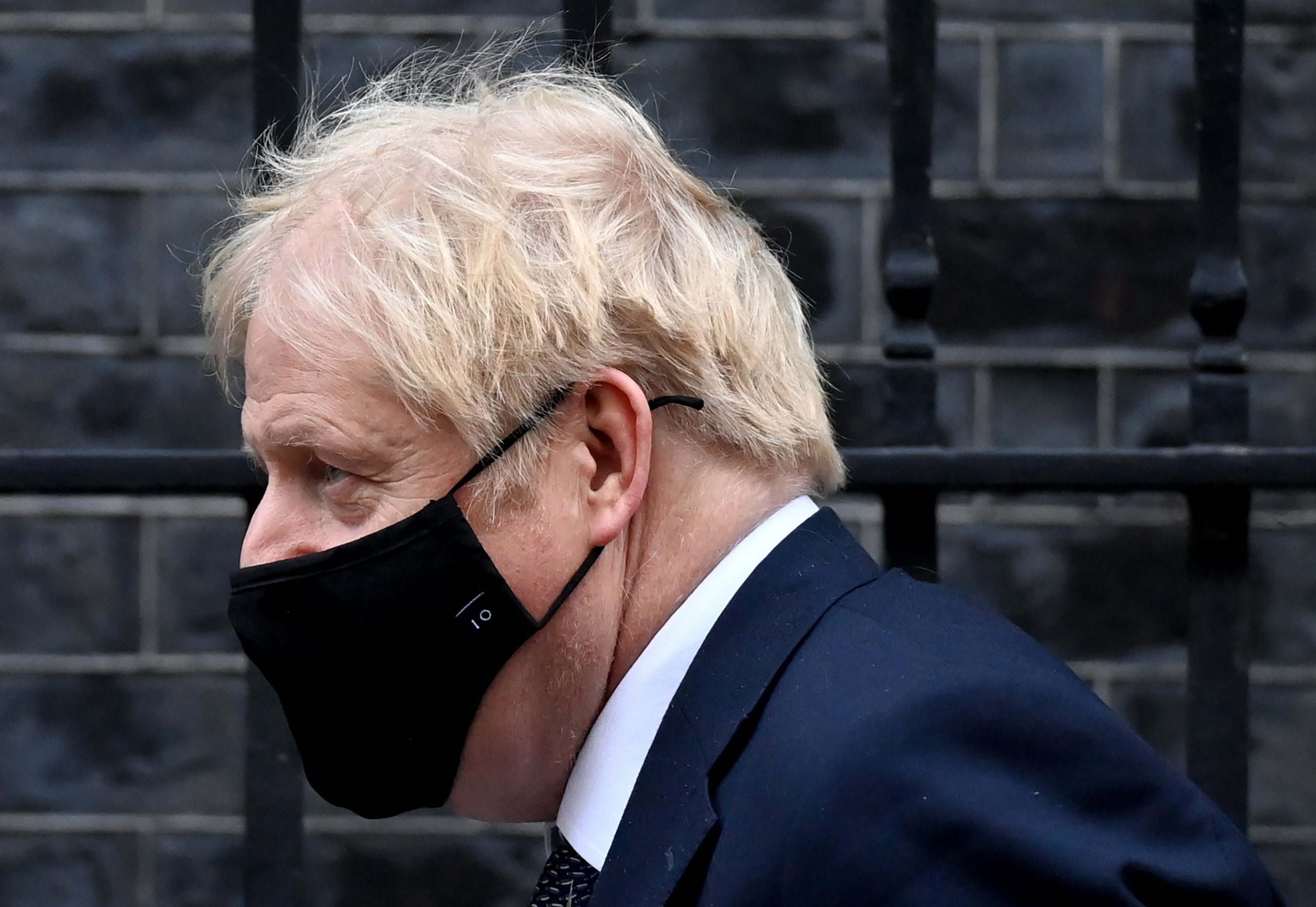 epa08798069 British Prime Minister Boris Johnson wearing a face mask leaves no10 Downing Street to attend Prime Minister Questions in the Houses of Parliament in London, Britain, 04 November 2020. A second national lockdown is set to come into force in England from 05 November and is supposed to end on 02 December 2020.  EPA/FACUNDO ARRIZABALAGA