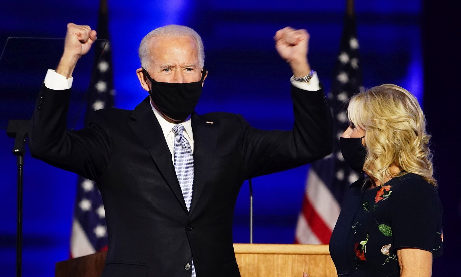 epaselect epa08806595 President-elect Joe Biden (L) and Dr. Jill Biden (R) after Biden delivered his victory address after being declared the winner in the 2020 presidential election in Wilmington, Delaware, USA, 07 November 2020. Biden defeated incumbent US President Donald J. Trump.  EPA/JIM LO SCALZO
