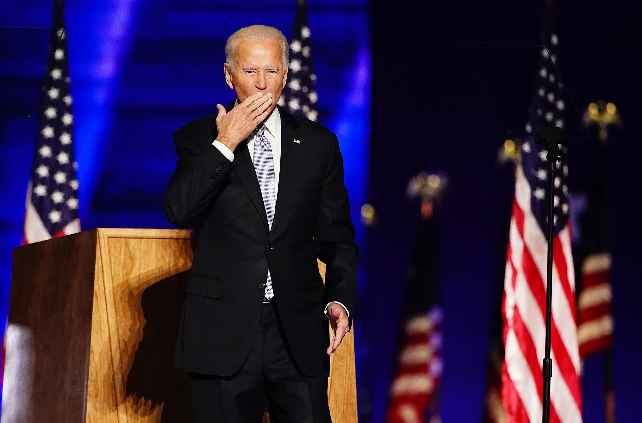 epa08806573 President-elect Joe Biden blows a kiss after delivering his victory address after being declared the winner in the 2020 presidential election in Wilmington, Delaware, USA, 07 November 2020. Biden defeated incumbent US President Donald J. Trump.  EPA/JIM LO SCALZO