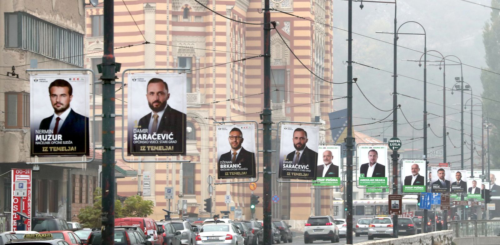 epa08818669 A general view showing various election campaign posters in Sarajevo, Bosnia and Herzegovina, 13 November 2020. More than three million Bosnian citizens are eligible to vote in the country's Local elections on 15 November 2020.  EPA/FEHIM DEMIR