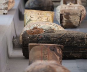 epa08819627 Sarcophaguses are presented to the media near the newly discovered burial site at Saqqara Necropolis in Giza, Egypt, 14 November 2020. The large number of colored human coffins are more than 2,500 years old, aoccording to Egypt's Ministry of Tourism and Antiquities.  EPA/Mohamed Hossam