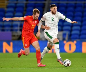 epa08822483 Rhys Norrington-Davies of Wales (L) in action against Matt Doherty of Ireland (R) during the UEFA Nations League soccer match between Wales and Ireland at the Cardiff City stadium in Cardiff, Britain, 15 November 2020.  EPA/PETER POWELL