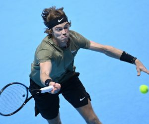 epa08826138 Russia's Andrey Rublev returns to Stefanos Tsitsipas of Greece during a Nitto ATP finals tennis match at the O2 Arena in  London, Britain, 17 November 2020.  EPA/ANDY RAIN