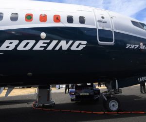 epa08827139 (FILE) - A Boeing 737 Max is on display at the Farnborough International Airshow (FIA2018), in Farnborough, Britain, 17 July 2018 (reissued 18 November 2020). The U.S. Federal Aviation Administration (FAA) on 18 November 2020 rescinded the order that halted commercial operations of Boeing 737-8 and 737-9 passenger planes. FAA said the changes in design it had demanded 'eliminated what caused these particular accidents', referring to two crashes involving Boeing 737 Max planes in Ethiopia and Indonesia.  EPA/ANDY RAIN *** Local Caption *** 55570479