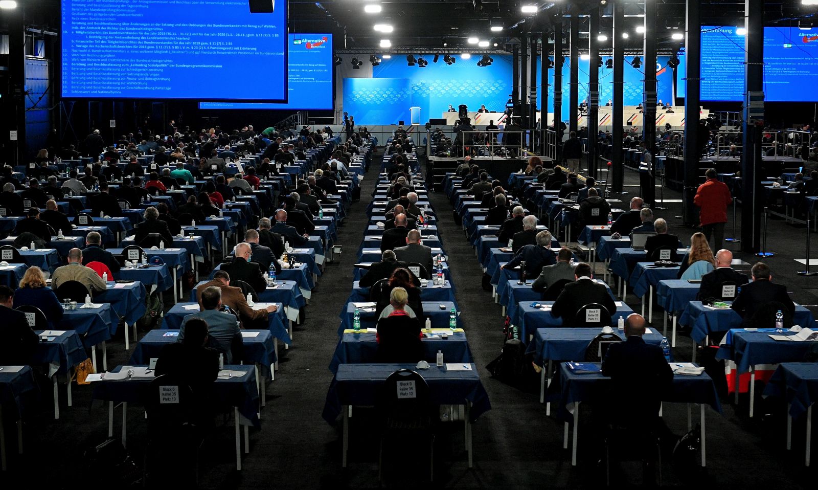 epa08848632 Delegates attend Germany's right-wing populist Alternative for Germany (AfD) party convention with 600 delegates in Kalkar, Germany, 28 November 2020. Despite the Corona pandemic, the AfD meets for a party conference. The 600 delegates want to adopt a welfare state and pension concept.  EPA/SASCHA STEINBACH