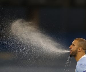 Champions League - Group C - Manchester City v Olympiacos Soccer Football - Champions League - Group C - Manchester City v Olympiacos - Etihad Stadium, Manchester, Britain - November 3, 2020 Manchester City's Kyle Walker spits out water before the match REUTERS/Phil Noble PHIL NOBLE