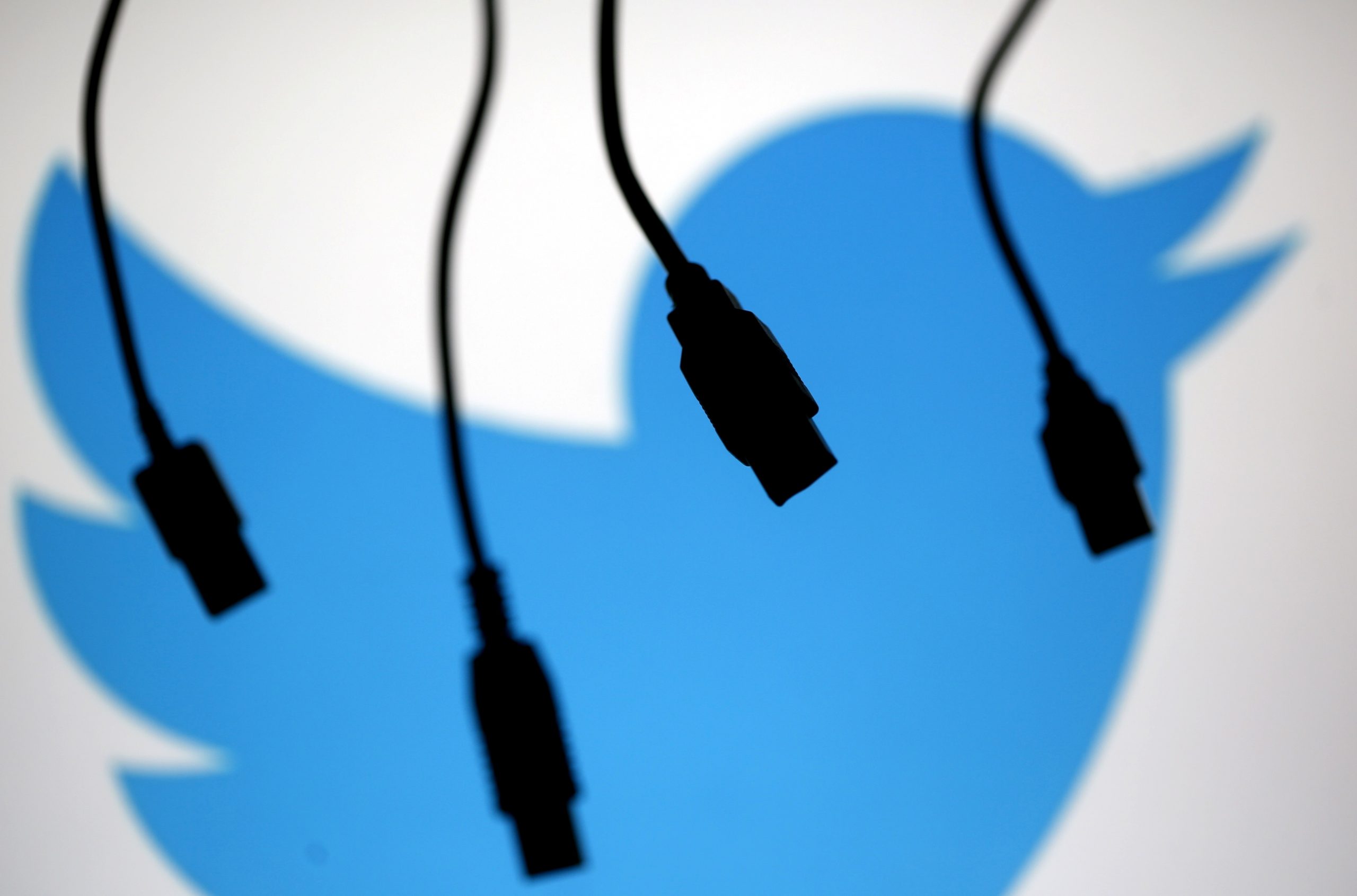 FILE PHOTO: Electronic cables are silhouetted next to the logo of Twitter in this illustration photo in Sarajevo FILE PHOTO: Electronic cables are silhouetted next to the logo of Twitter in this September 23, 2014 illustration photo in Sarajevo.   REUTERS/Dado Ruvic/File Photo Dado Ruvic