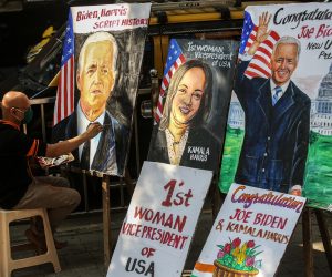 epa08807038 Indian artist Sagar Kambli puts the final touch to a painting showing the newly elected US President Joe Biden and Vice President Kamala Harris, to mark their victory in the US Presidential elections, outside his workshop in Mumbai, India, 08 November 2020. Major news organizations have called the US presidential election 2020 for democrat Joe Biden, defeating incumbent US President Donald J. Trump.  EPA/DIVYAKANT SOLANKI
