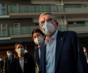 epa08824560 International Olympic Committee President Thomas Bach (R) wearing a protective during a visit of Olympic and Paralympic village on downtown on in Tokyo, Japan, 17 November 2020. Mr Bach is making a three-day visit to Tokyo to discuss the 2020 Olympic and Paralympic Games that were postponed because of the Covid-19 coronavirus pandemic. Tokyo, JAPAN 17 November 2020.  EPA/Nicolas Datiche / POOL