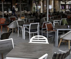 epa08825312 An empty caffe in Belgrade, Serbia, 17 November 2020. Serbia is witnessing a rise in coronavirus infections prompting the government to consider new restrictions like limiting the work hours to 9pm to all non essential industries.  EPA/ANDREJ CUKIC