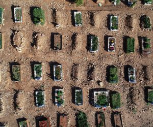 epa08837322 An aerial picture taken by drone shows newly buried graves of Covid-19 victims at the Baklaci cemetery in Istanbul, Turkey, 23 November 2020.  Istanbul mayor Ekrem Imamoglu said that 184 people died due to Covid-19 in Istanbul on 22 November 2020. The Turkish government has introduced partial curfews and other measures to curb increasing COVID-19 cases in the country, while health experts call for a full lockdown and more transparency in pandemic data.  EPA/ERDEM SAHIN