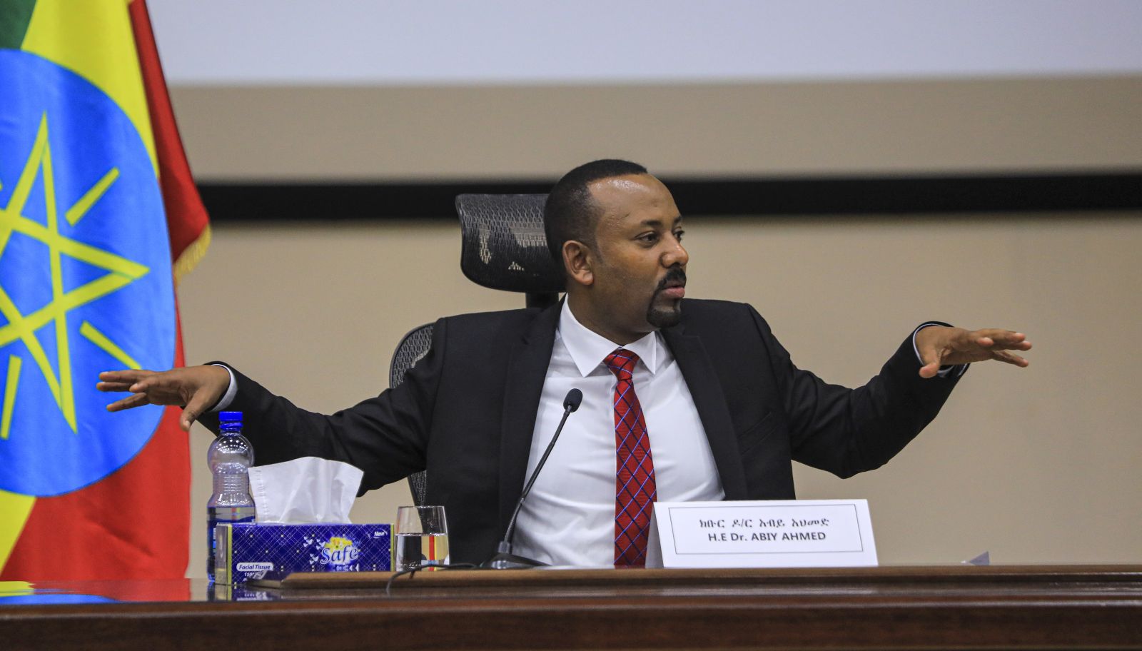 epa08852859 Ethiopian Prime Minister Abiy Ahmed speaks during a question and answer session in parliament, Addis Ababa, Ethiopia 30 November 2020. Ethiopia’s military intervention in the northern Tigray region comes after Tigray People's Liberation Front (TPLF) forces allegedly attacked an army base on 03 November 2020 sparking weeks of unrest with over 40,000 refugees fleeing to Sudan.  EPA/STR